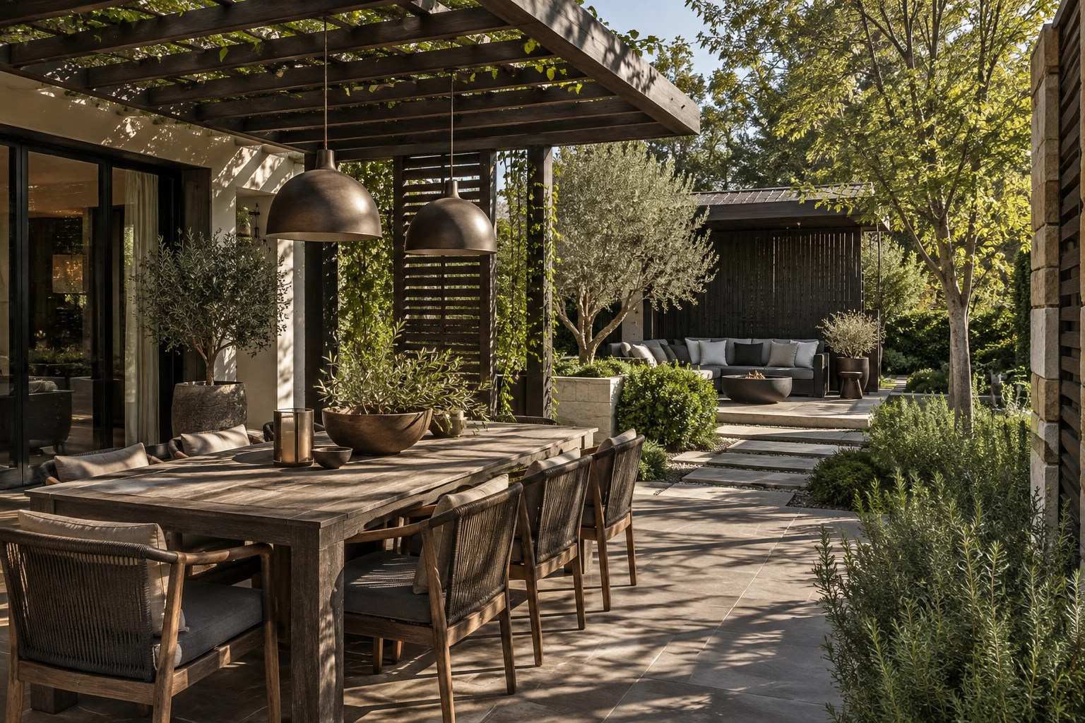 Original architectural concept of A sequence of outdoor rooms, a dark-timber lattice pergola over dining seating linked to a separate garden lounge and simple planted paths in clear afternoon light
