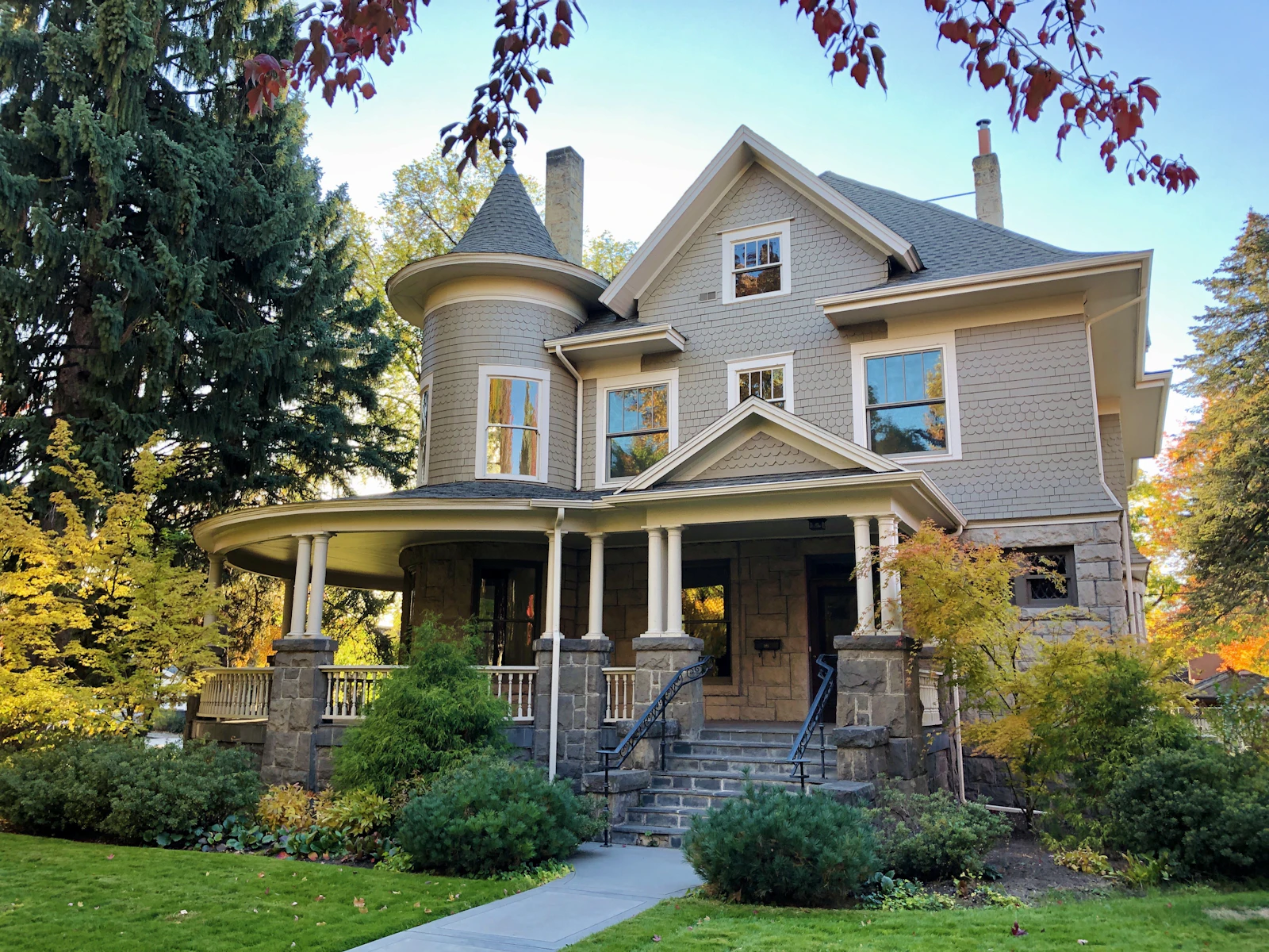 Illustrative photo of a large house with a front yard