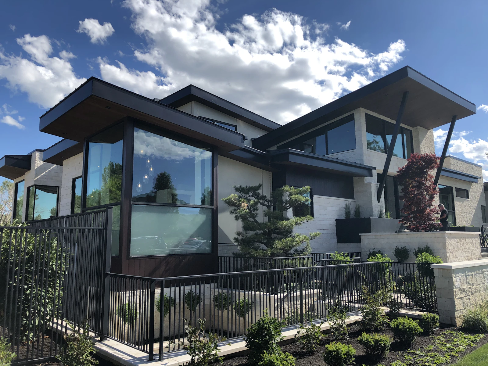 Illustrative photo of white and brown wooden house under blue sky during daytime